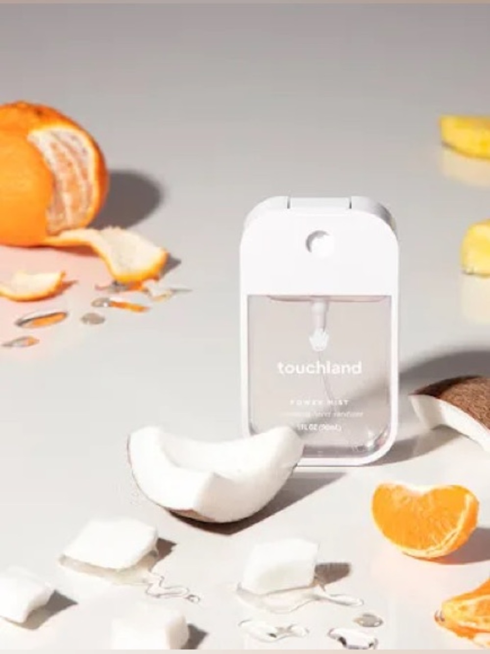 Touchland Power Mist Hydrating Hand Sanitizer in the "Beach Coco" scent